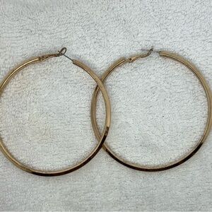 Gold Tone Large Snap Shut Hoop Earrings